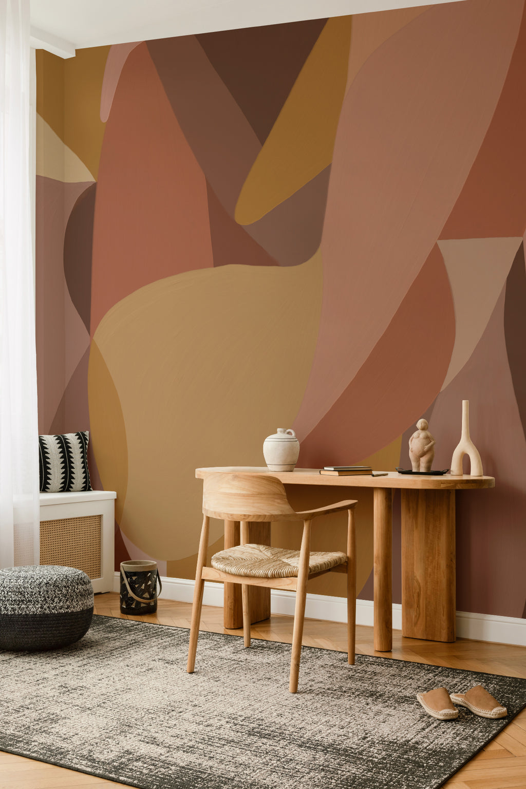 The Muse Silhouette mural in cinnamon and rose in a living room