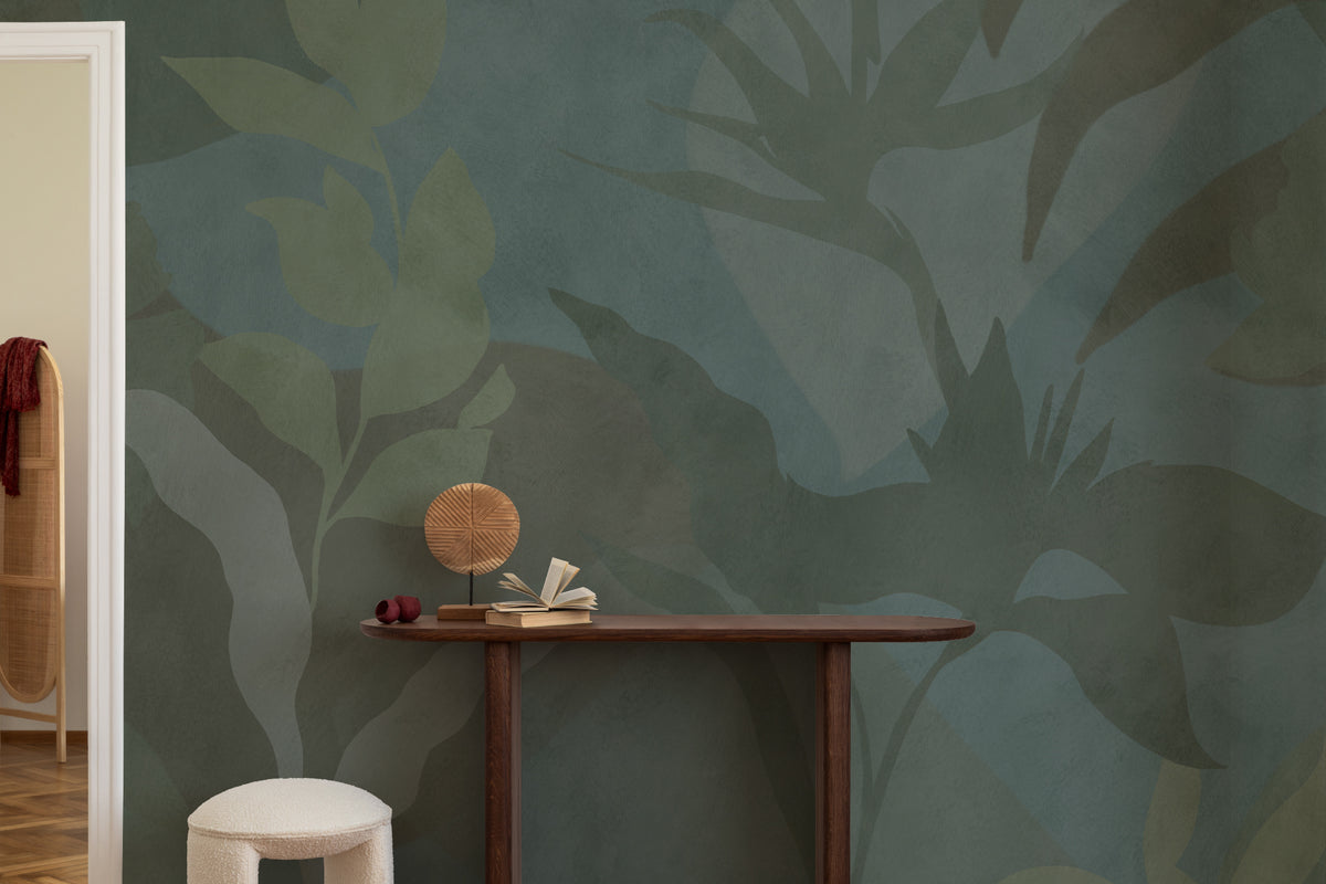 The Nocturne Fronds mural in deep teal and moss behind a styled console