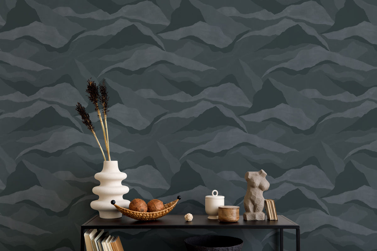 The Northern Ridge wallpaper in deep navy behind a styled console