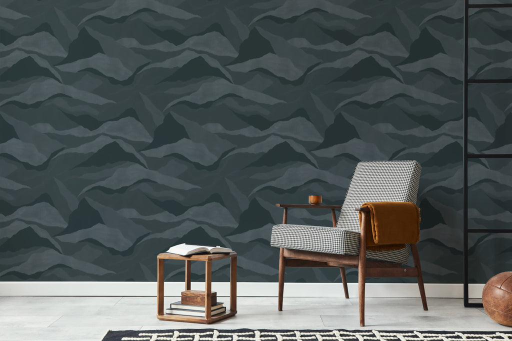 The Northern Ridge wallpaper in deep navy in a living room