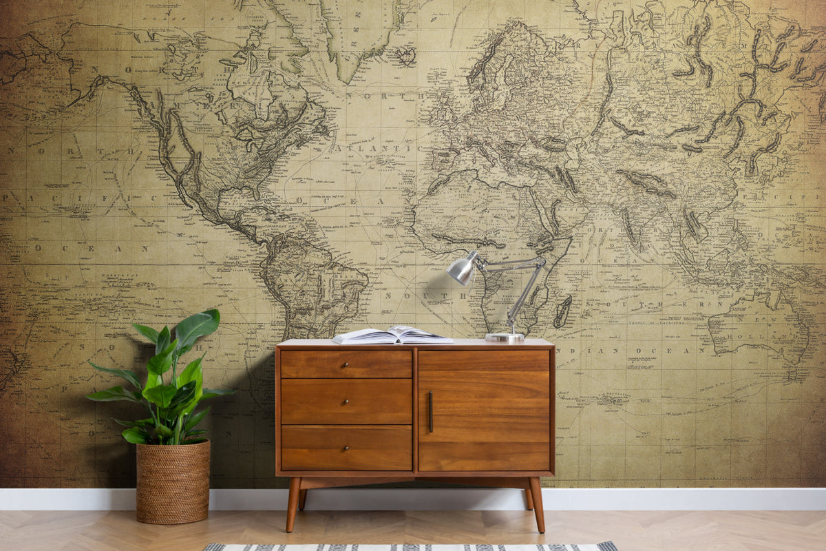 The Old World Atlas mural in parchment brown behind a desk in a home office