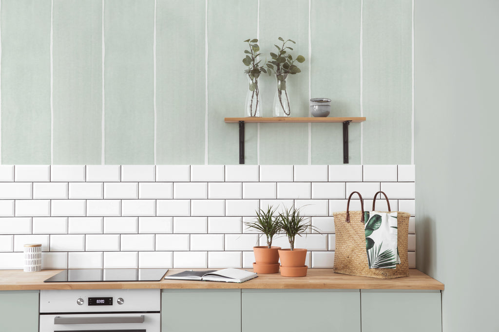 The Painted Awning wallpaper in mint sage in a kitchen