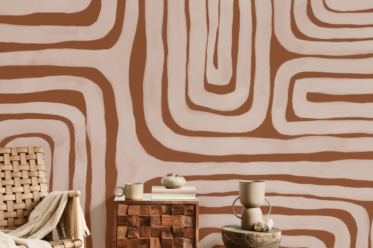 The Painted Labyrinth mural in terracotta and rose in a dining room