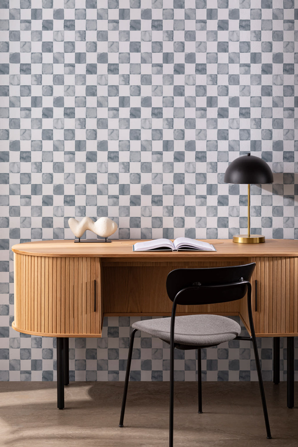 The Painted Tiling wallpaper in slate blue behind a desk in a home office