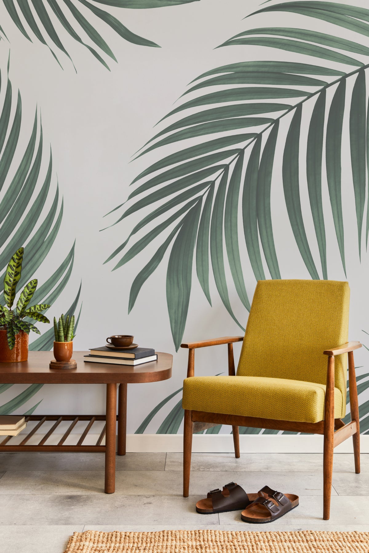The Palm Shade mural in palm green and dove grey in a living room