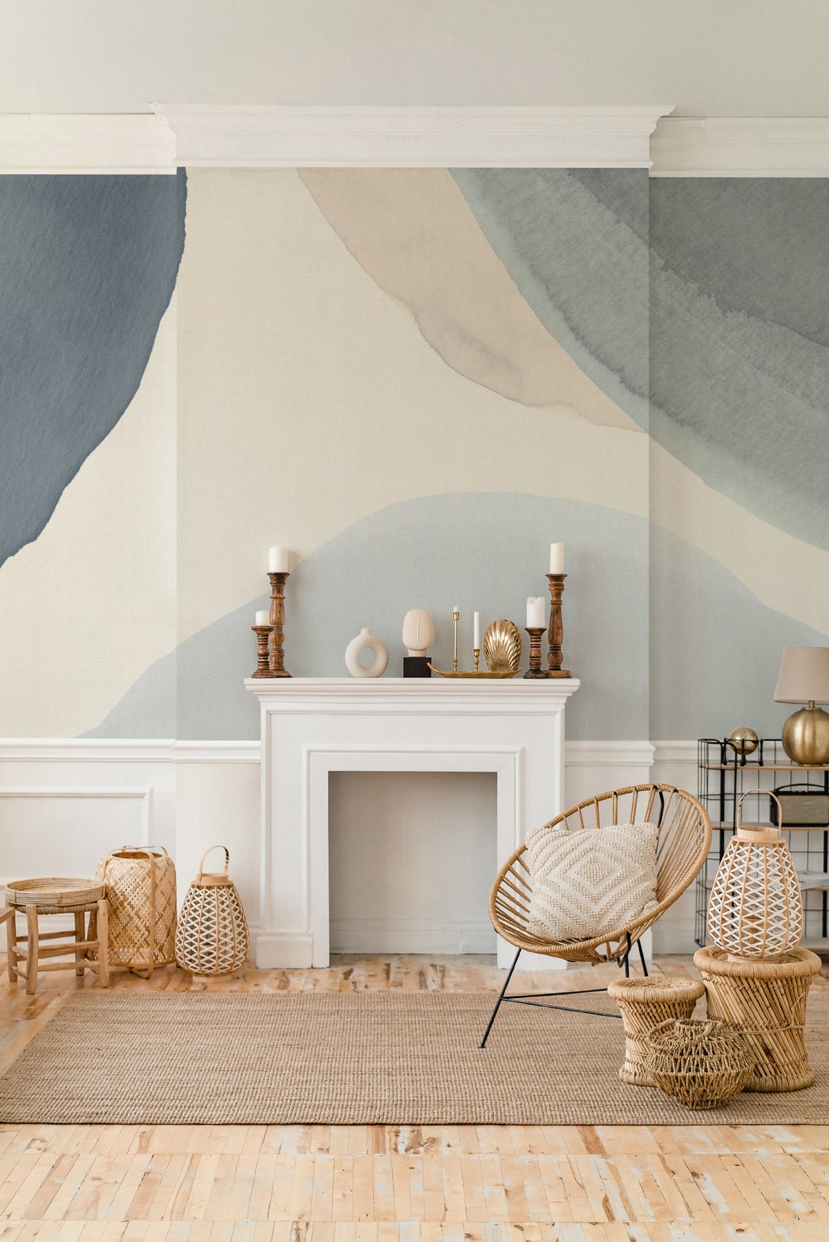 The Pebble Wash mural in denim and sand behind seating in a living room