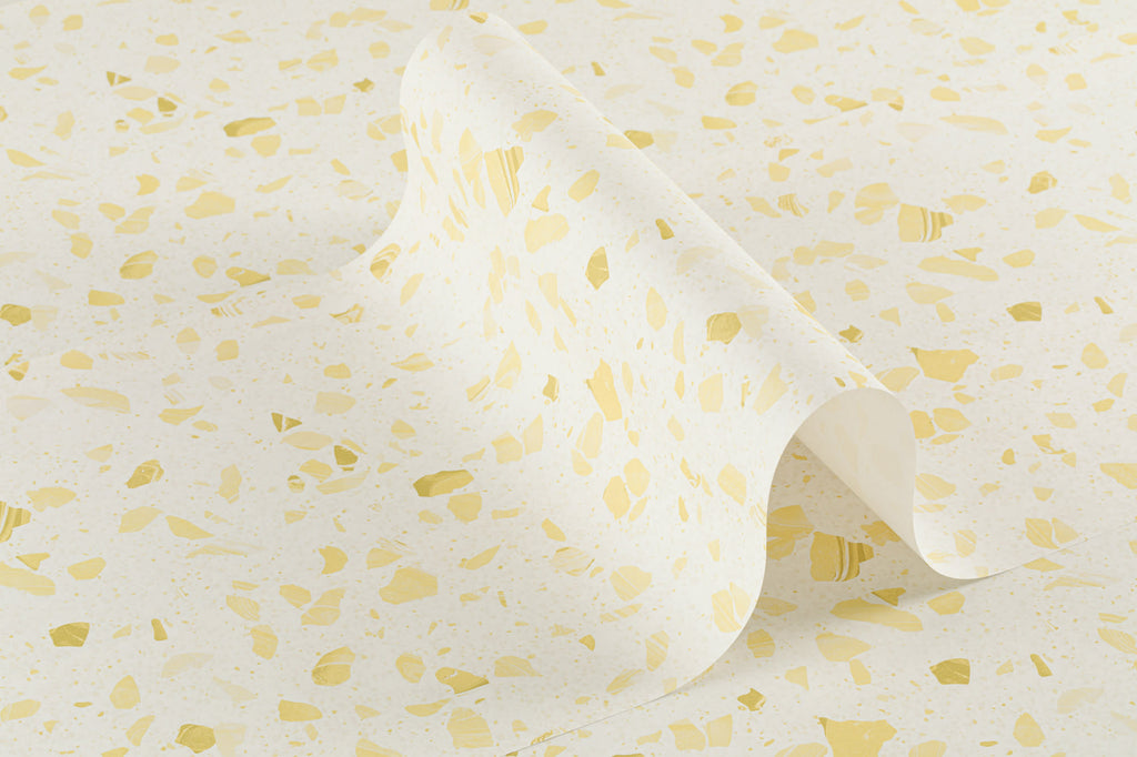 Roll of The Piazza Terrazzo wallpaper in lemon yellow
