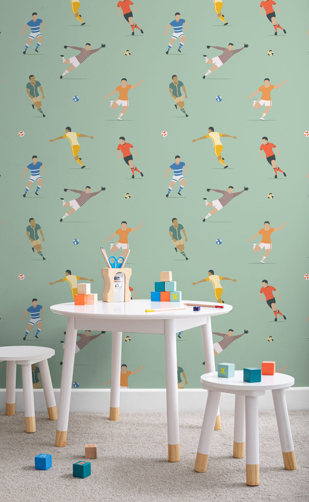The Pitchside Club wallpaper in pitch green in a child's bedroom
