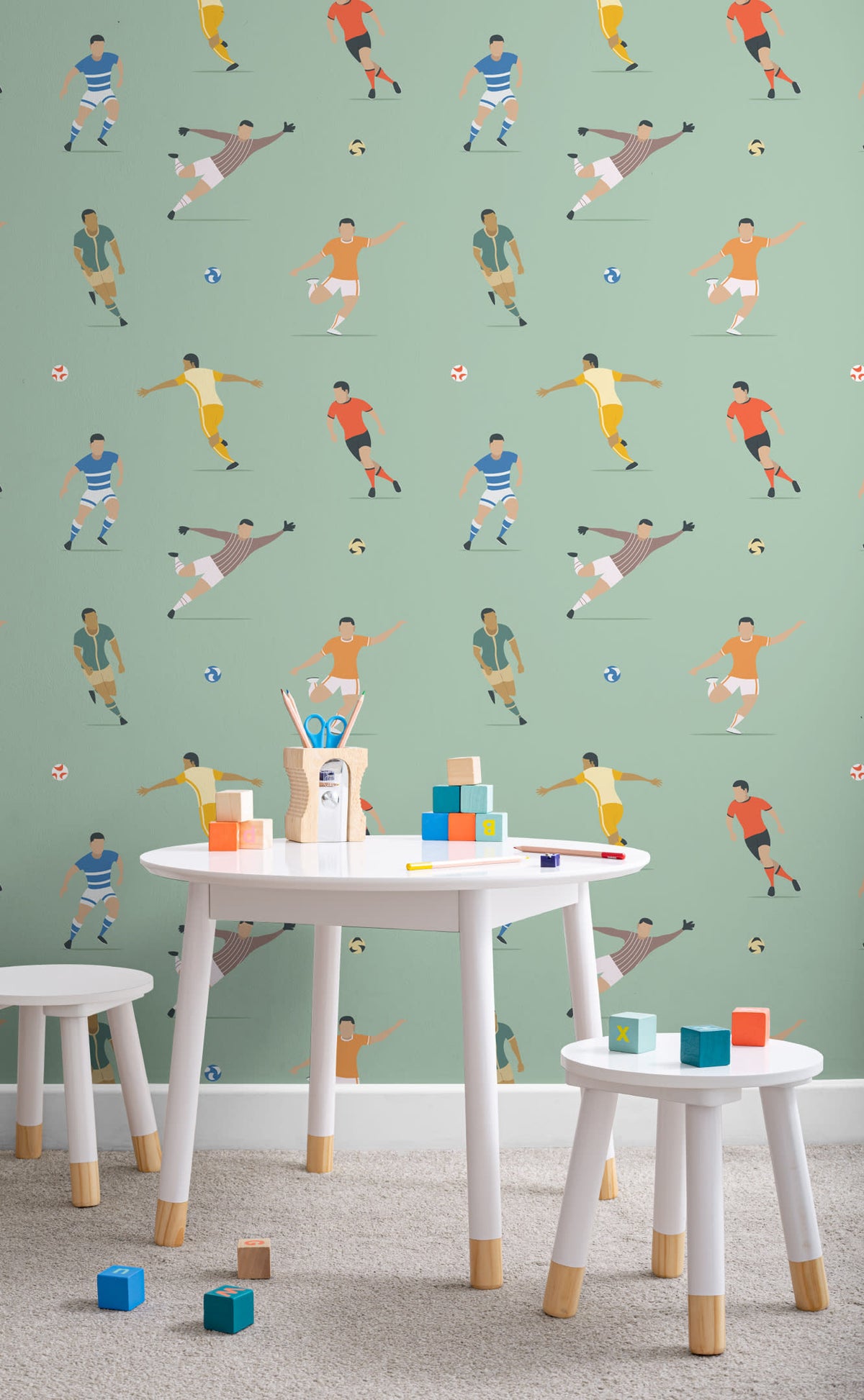 The Pitchside Club wallpaper in pitch green in a child's bedroom