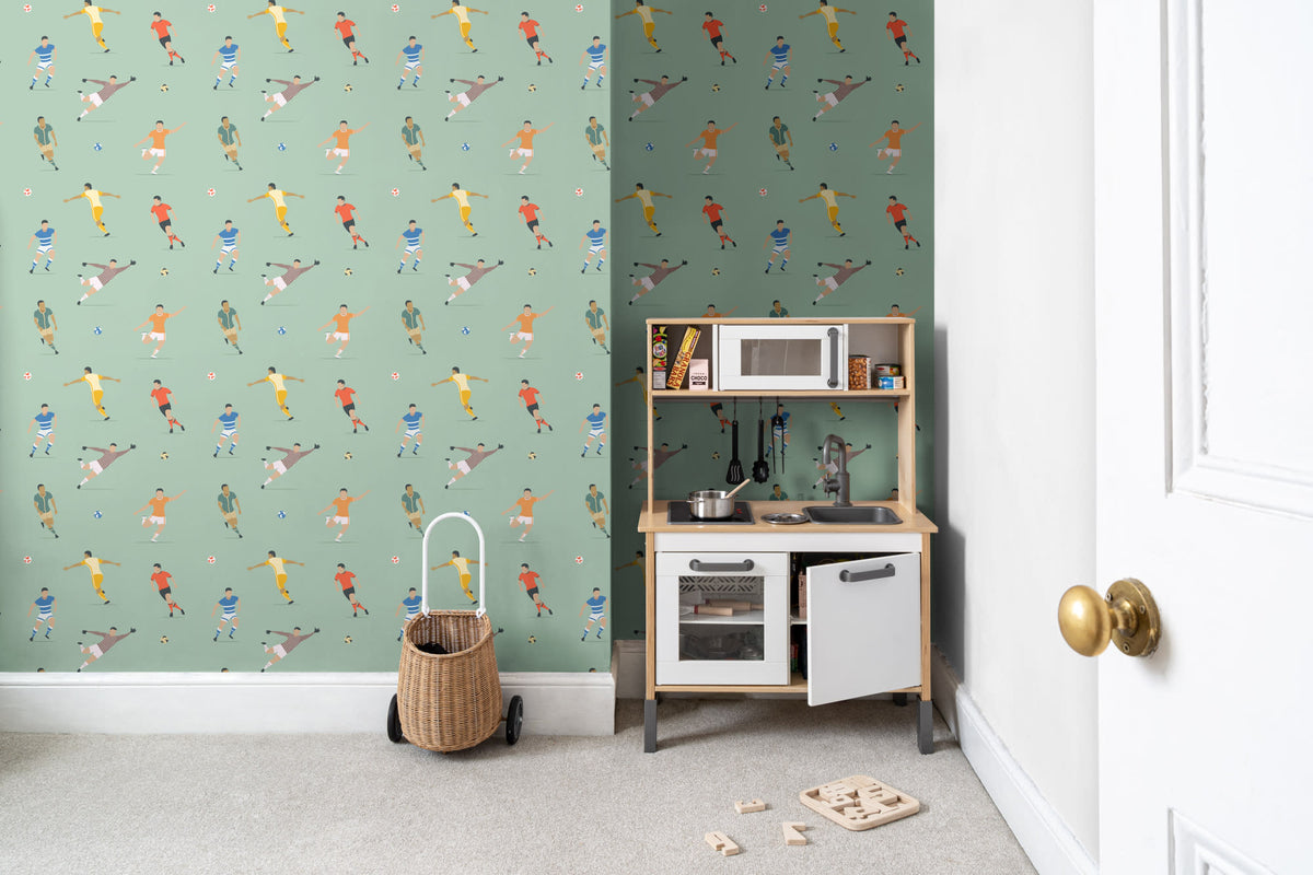 The Pitchside Club wallpaper in pitch green behind a kids' play corner
