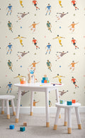 The Pitchside Club wallpaper in warm cream in a child's bedroom