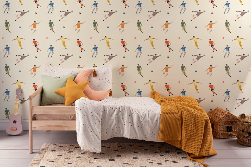 The Pitchside Club wallpaper in warm cream in a children's room setting, view 4