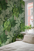 The Plant Room wallpaper in deep green in a living room