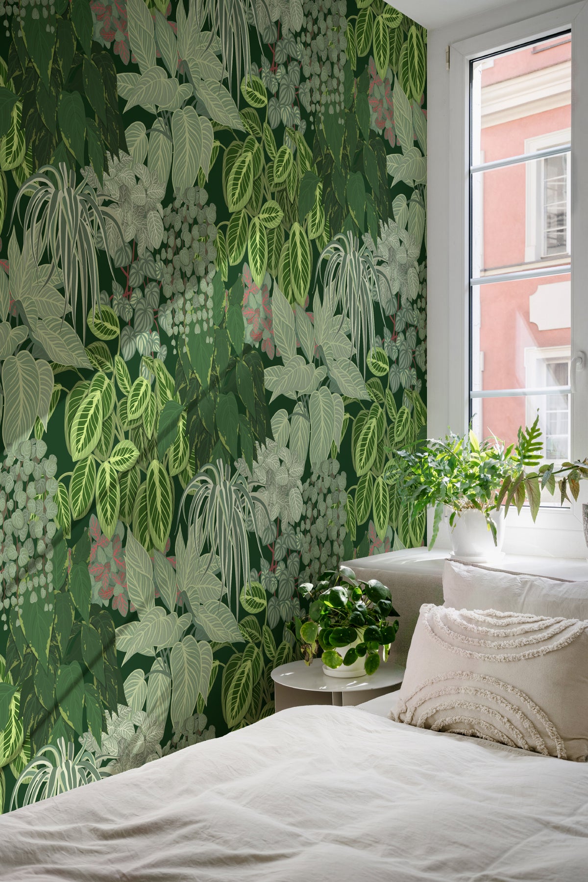 The Plant Room wallpaper in deep green in a living room