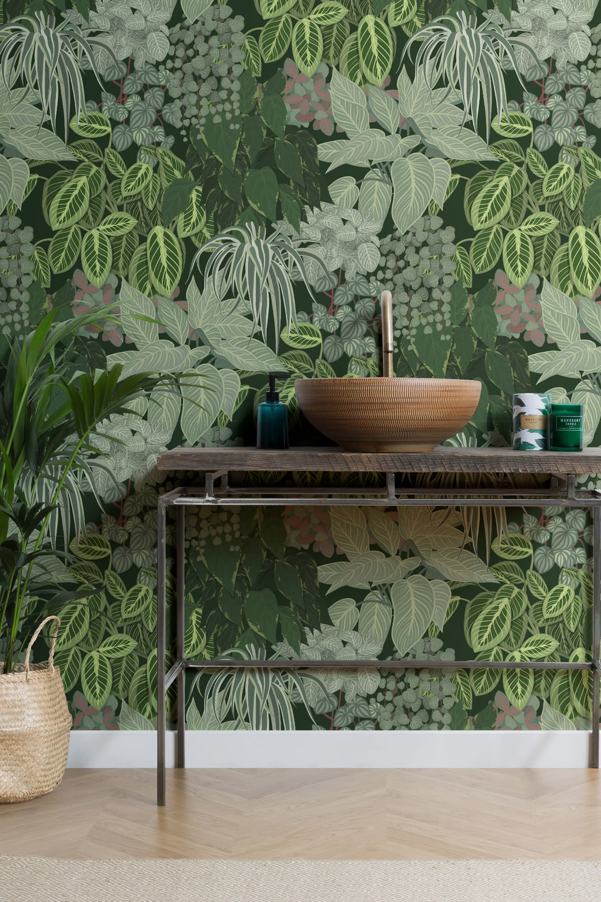 The Plant Room wallpaper in deep green behind a styled console