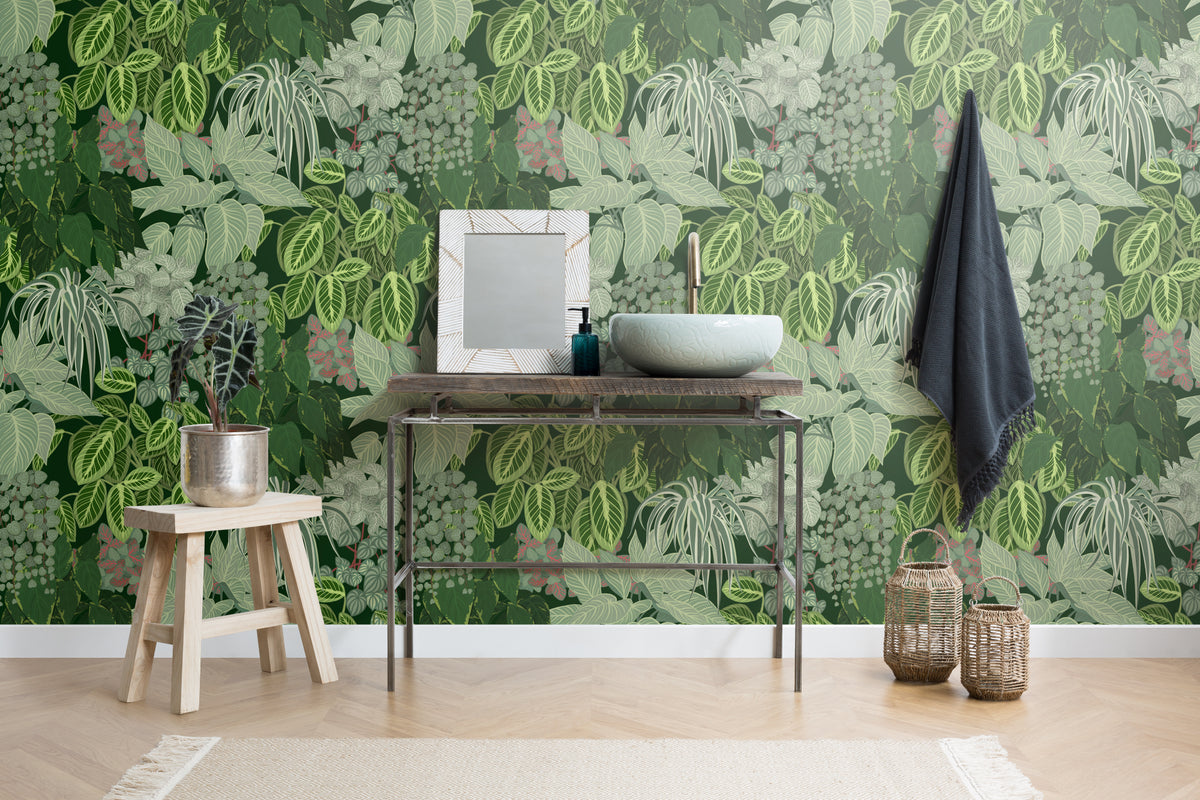 The Plant Room wallpaper in deep green behind a desk in a home office