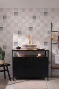 The Plaster Chequer wallpaper in soft greige behind a styled console