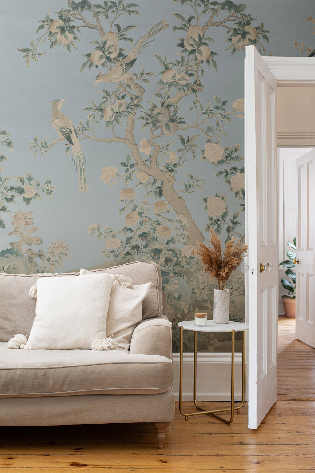 The Porcelain Screen mural in duck egg and stone in a living room