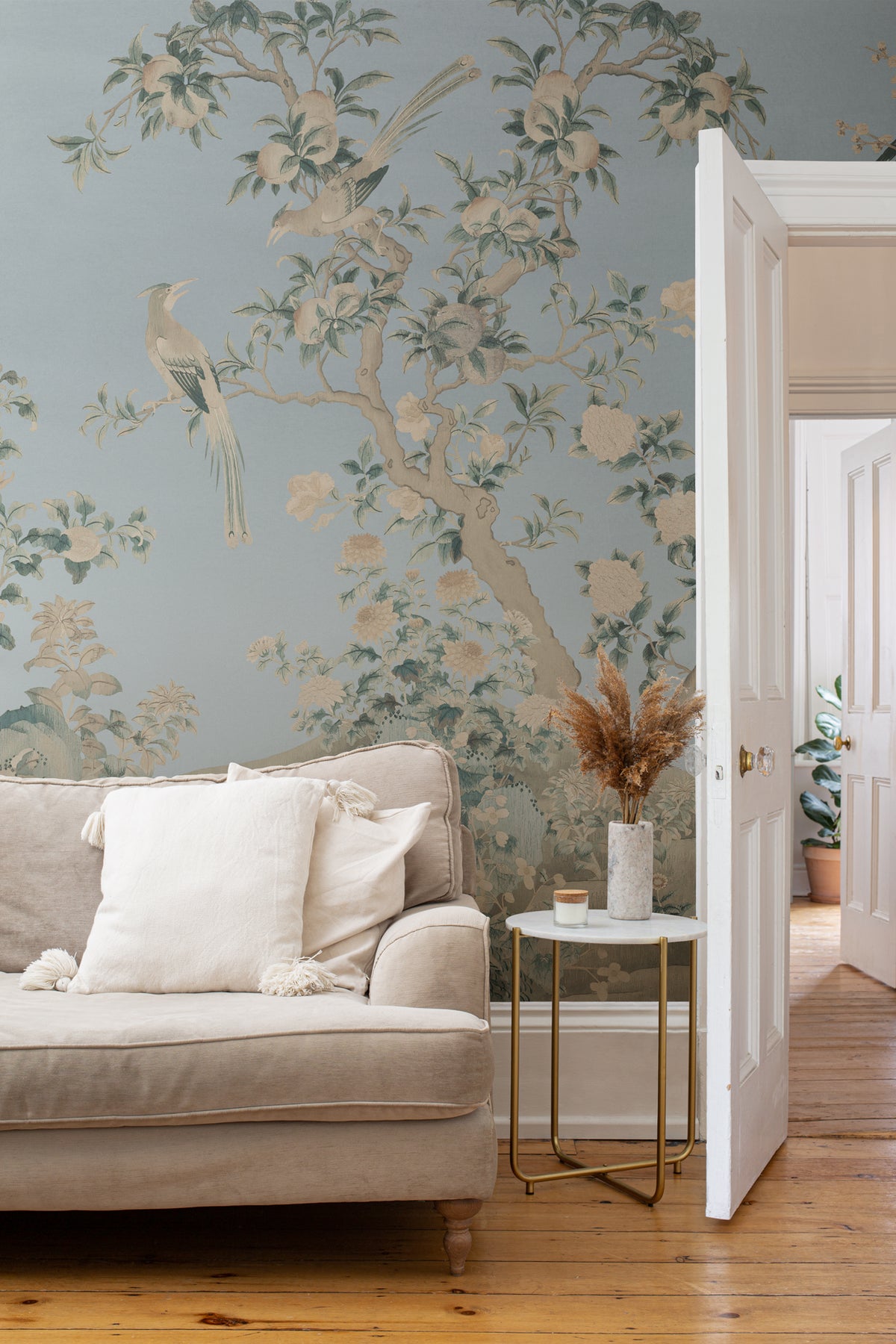 The Porcelain Screen mural in duck egg and stone in a living room