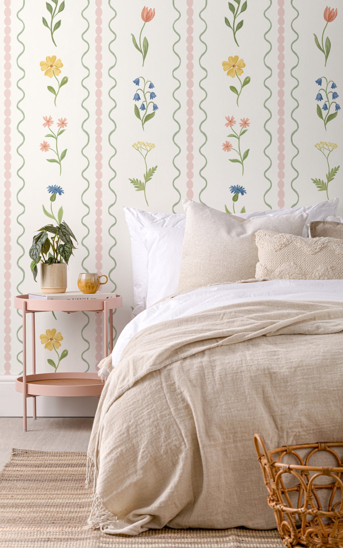 The Posy Braid mural in blush pink in a calm bedroom setting