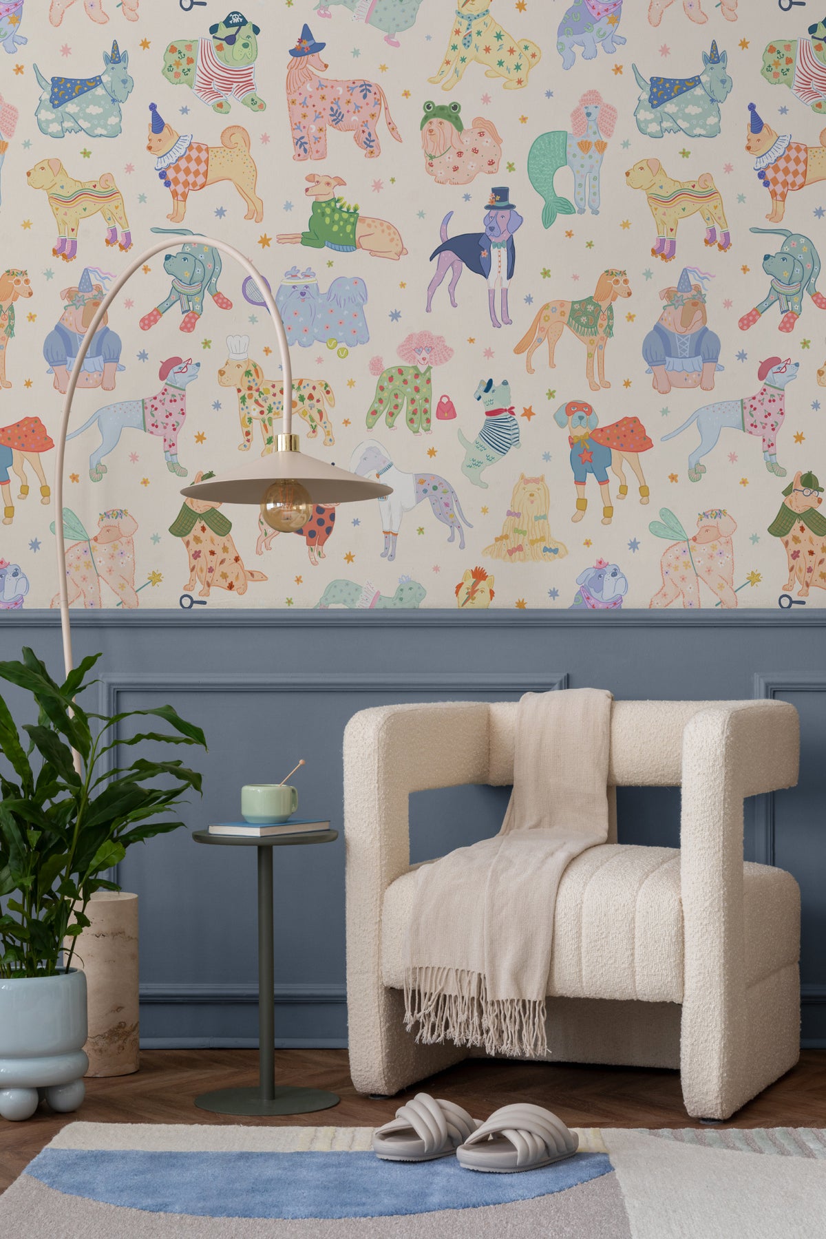 The Pup Carnival mural in sunny blue and yellow in a calm bedroom setting