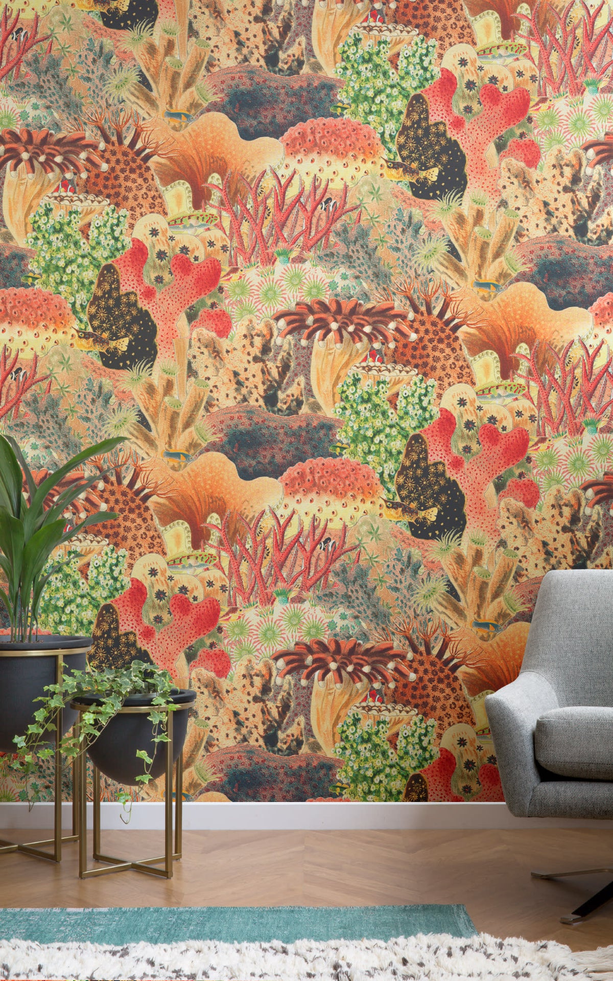 Angled detail of The Reef Cabinet mural in coral red and jade