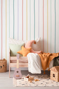 The Ribbon Lane wallpaper in sorbet pastel on a nursery wall