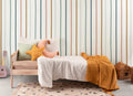 The Ribbon Lane wallpaper in spice and teal in a child's bedroom