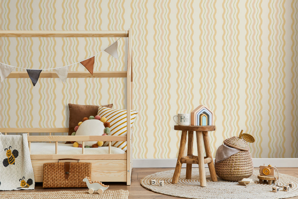 The Ripple Trim wallpaper in buttercup yellow in a child's bedroom