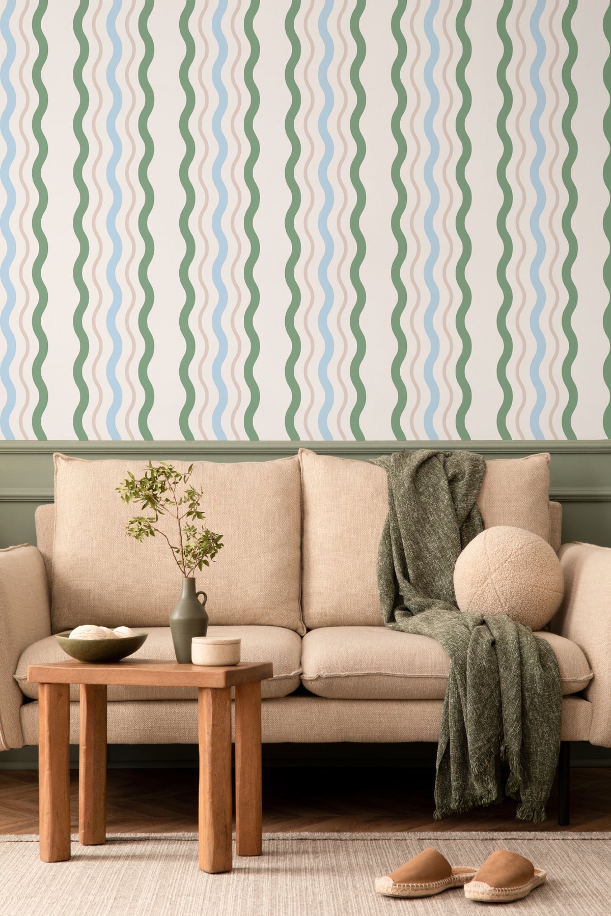 The Ripple Trim wallpaper in sage and sky in a living room