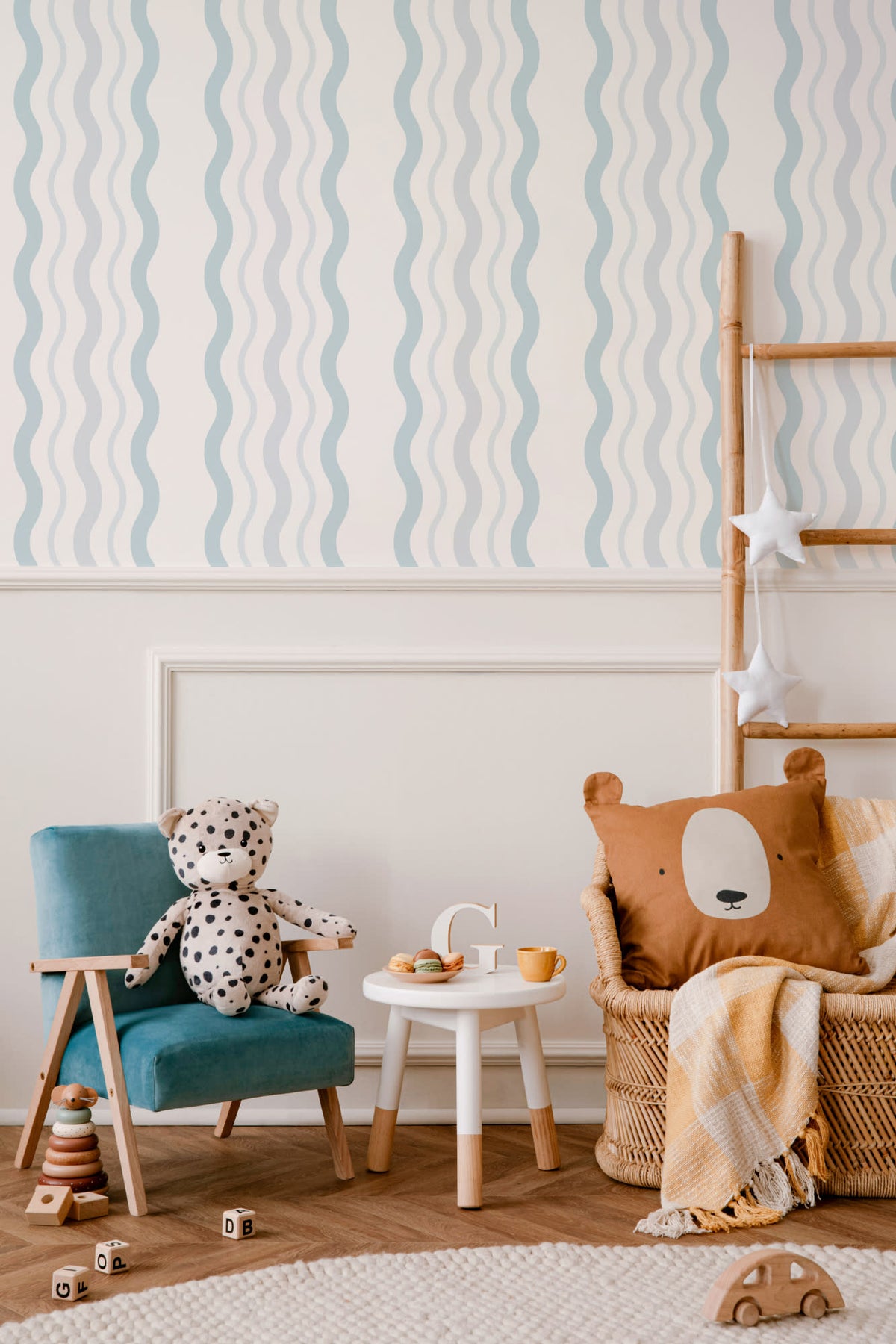 The Ripple Trim wallpaper in sky blue in a child's bedroom