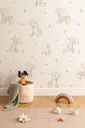 The Savanna Parade wallpaper in warm sand on a nursery wall