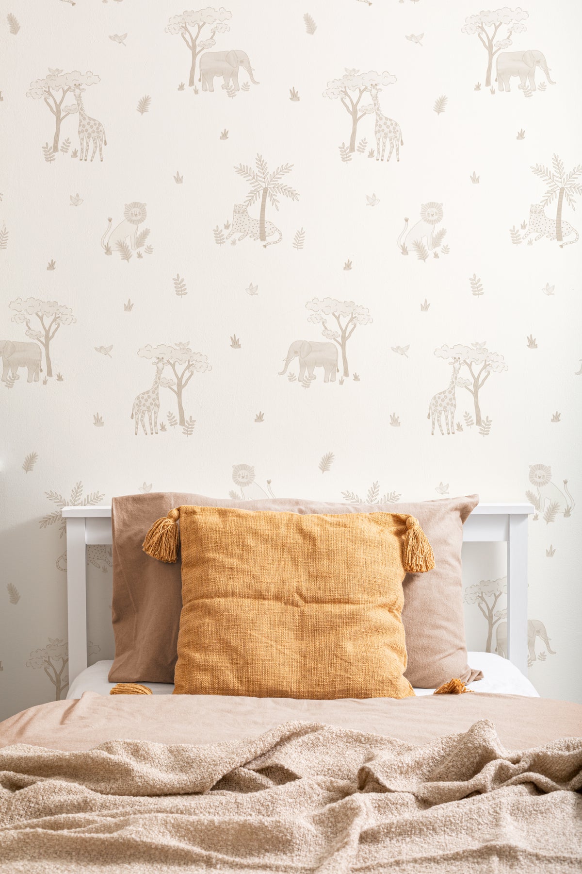 The Savanna Parade wallpaper in warm sand in a child's bedroom