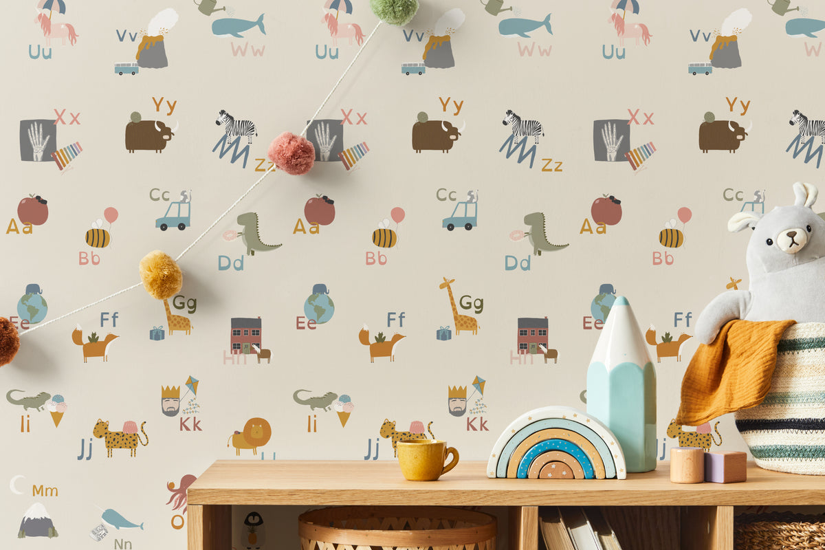 The Schoolroom Primer wallpaper in oatmeal and pastel in a child's bedroom