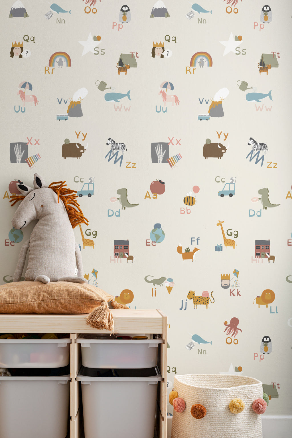 The Schoolroom Primer wallpaper in oatmeal and pastel in a children's room setting