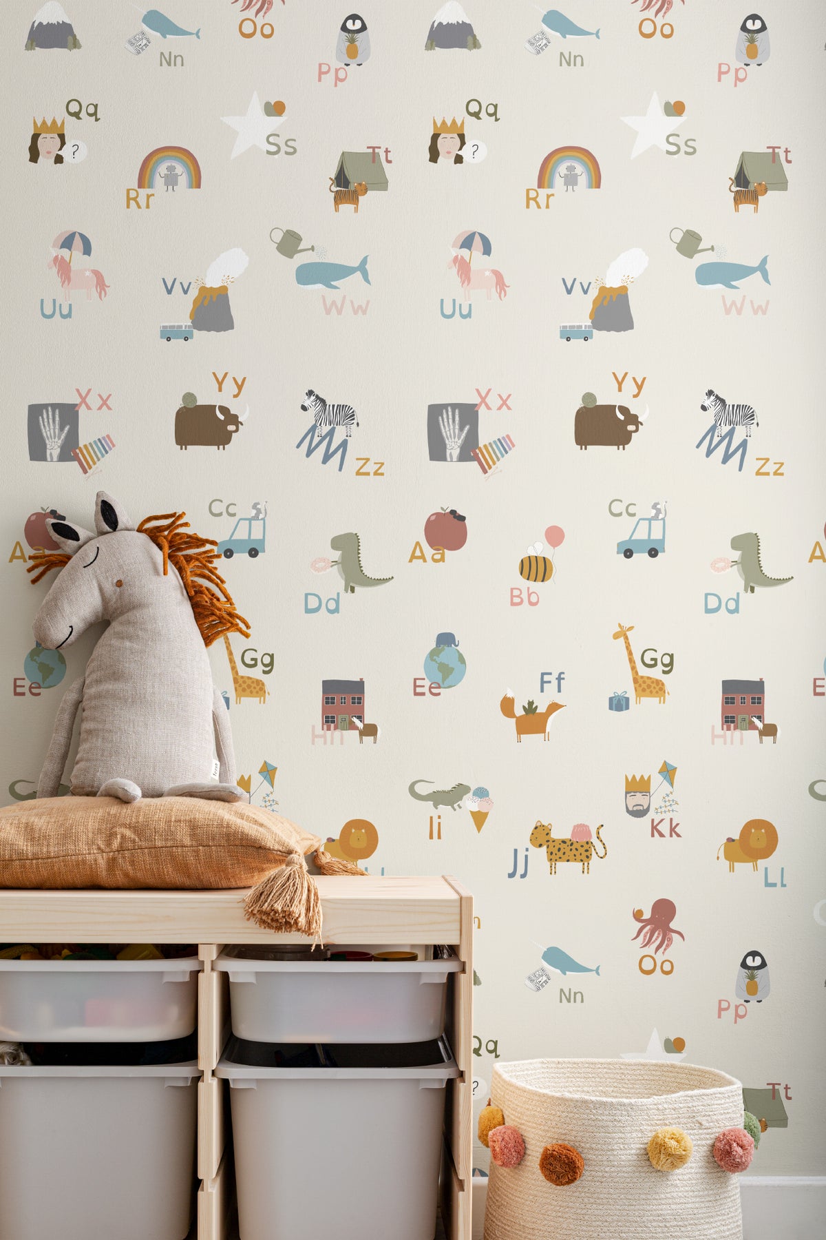The Schoolroom Primer wallpaper in oatmeal and pastel in a children's room setting
