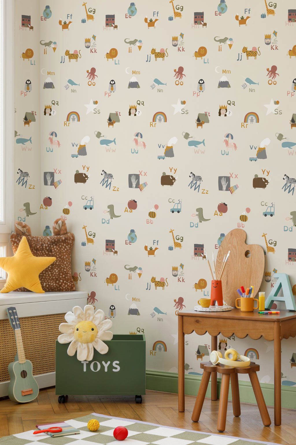 The Schoolroom Primer wallpaper in oatmeal and pastel in a children's room setting, view 4