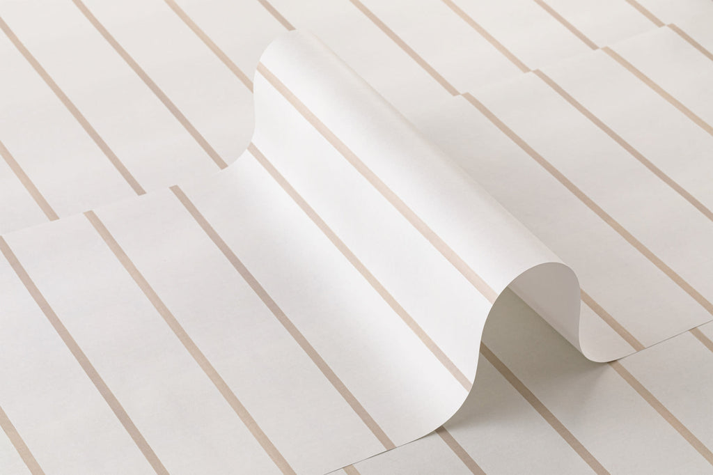 Roll of The Shoreline Stripe wallpaper in soft sand