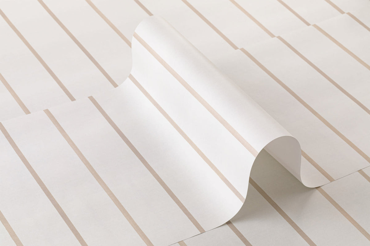 Roll of The Shoreline Stripe wallpaper in soft sand