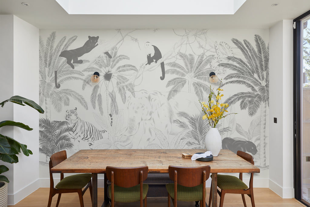 The Sketched Sanctuary mural in soft graphite behind a dining table