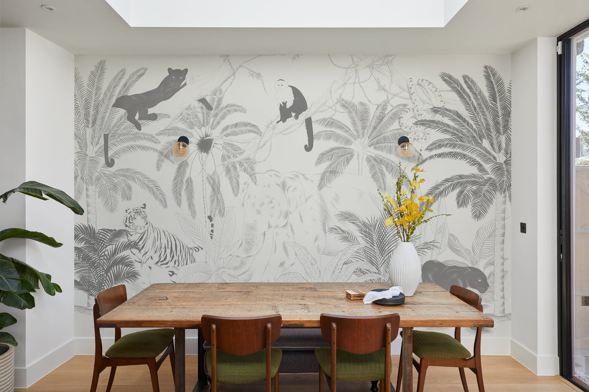 The Sketched Sanctuary mural in soft graphite behind a dining table