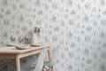 The Spruce Mist mural in fog grey behind a desk in a home office