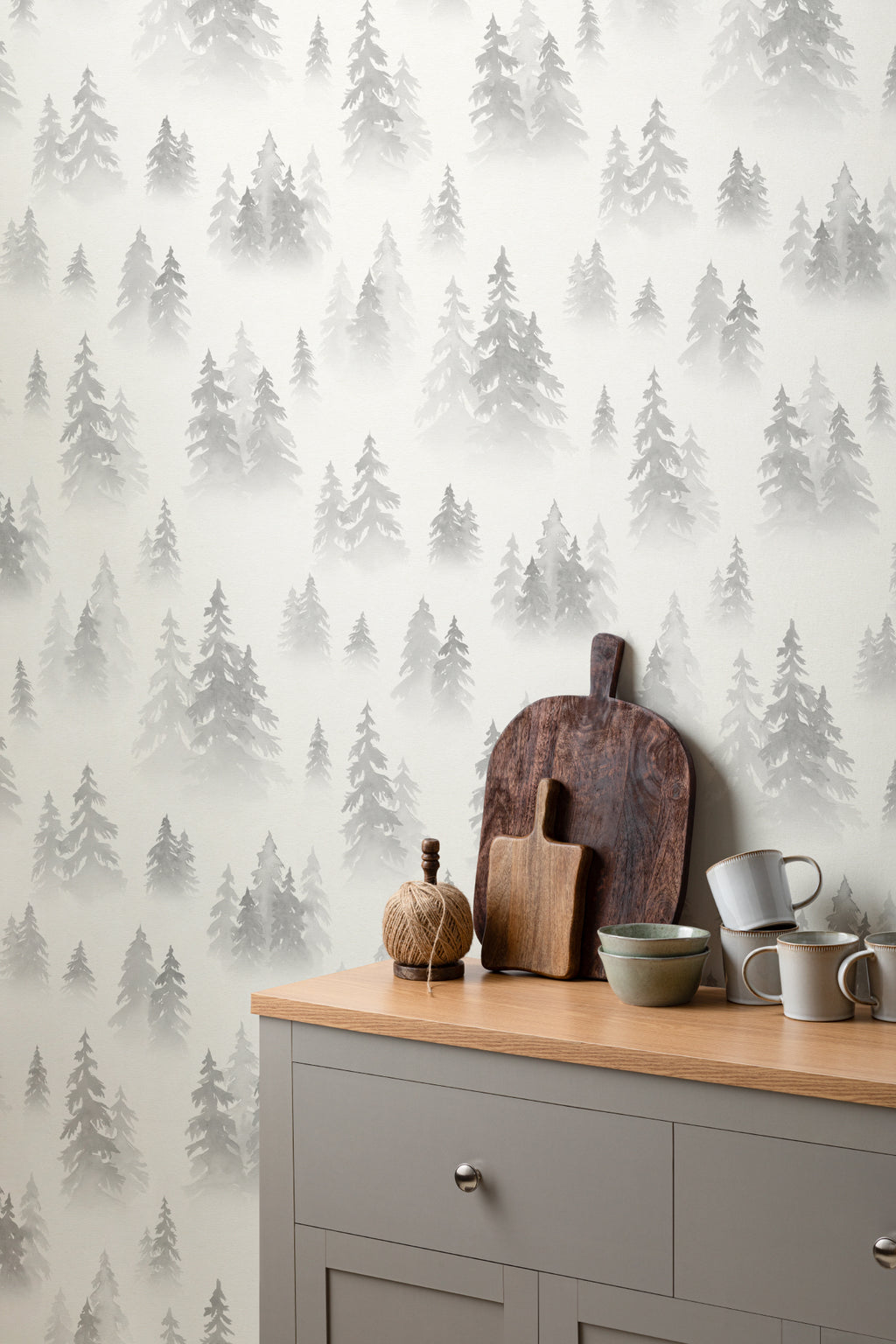 The Spruce Mist mural in fog grey behind the bed in a bedroom