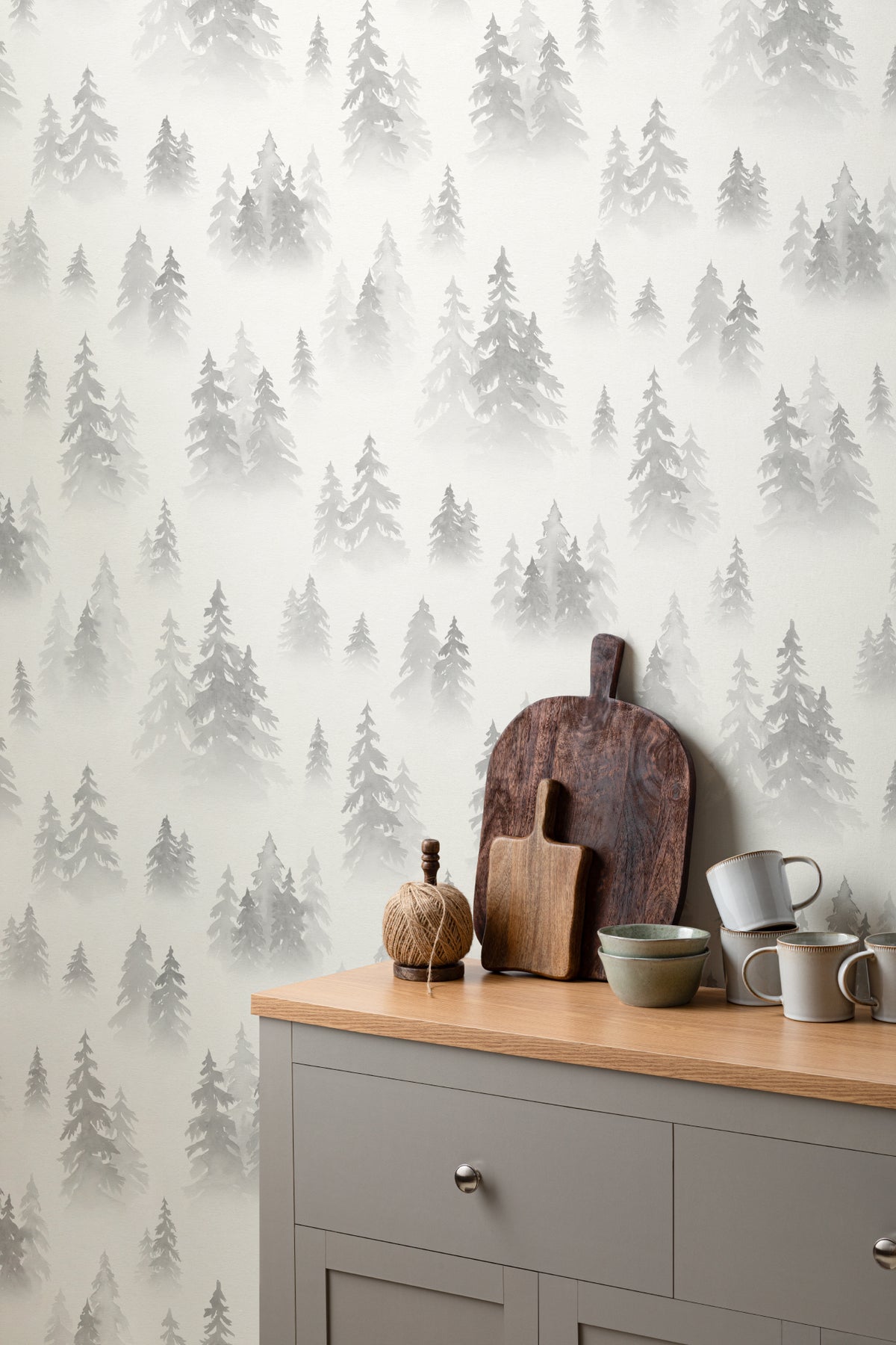 The Spruce Mist mural in fog grey behind the bed in a bedroom