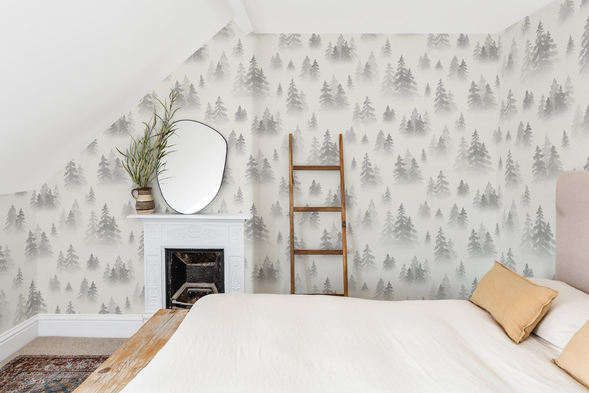The Spruce Mist mural in fog grey as a backdrop to styled furniture