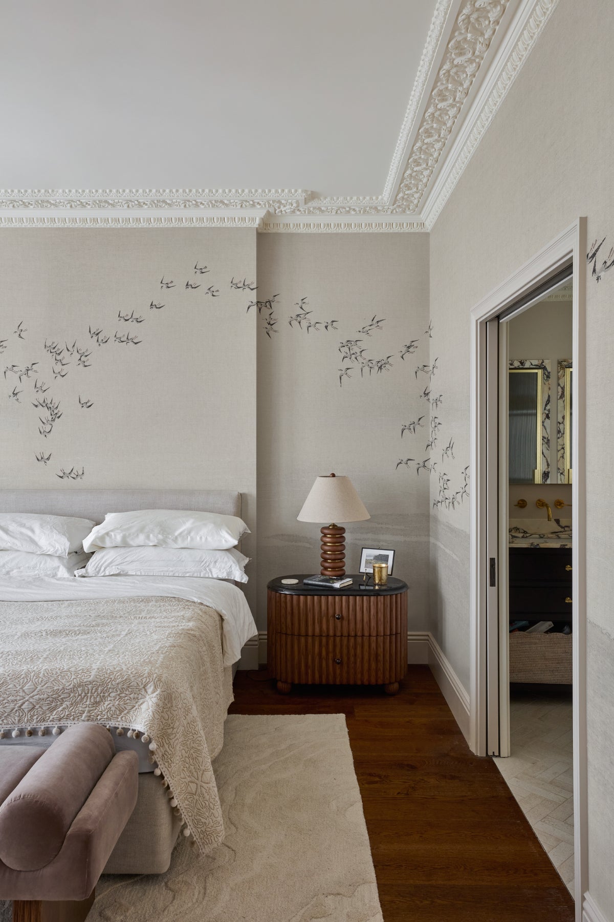 The Starling Murmuration mural in mist grey and oat in a hallway