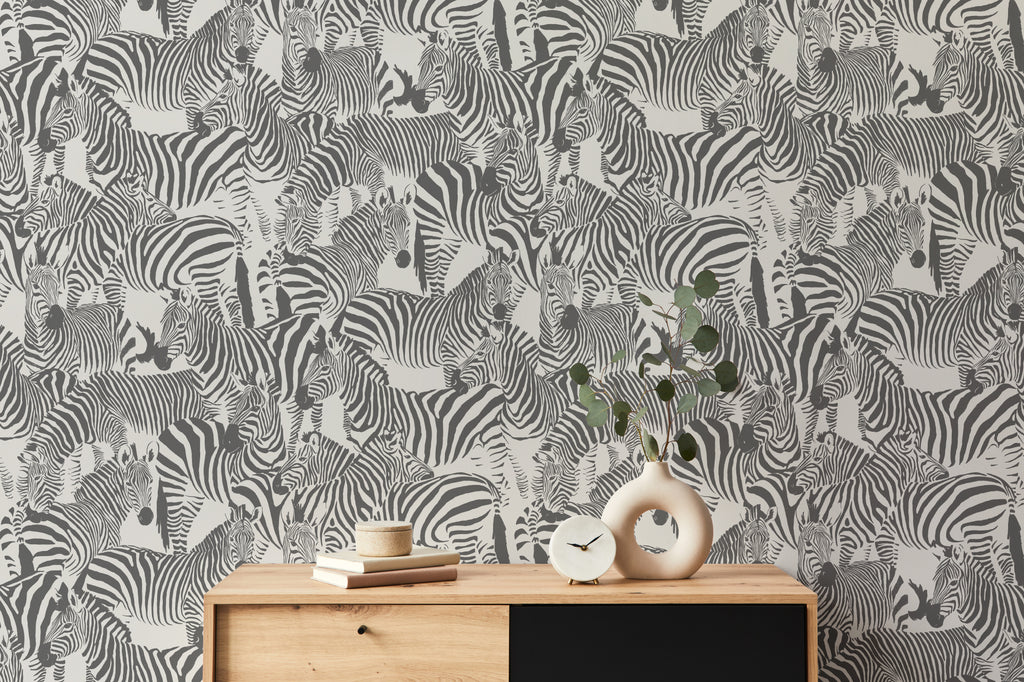 The Striped Herd wallpaper in black and white behind a styled console