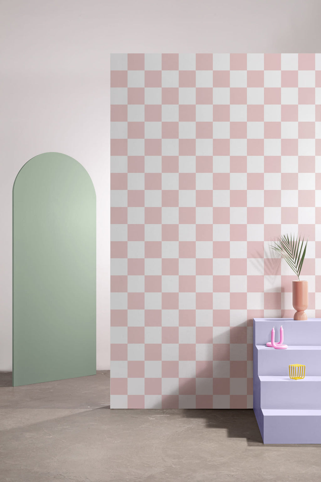 The Sugar Check wallpaper in candy pink and white behind a styled console