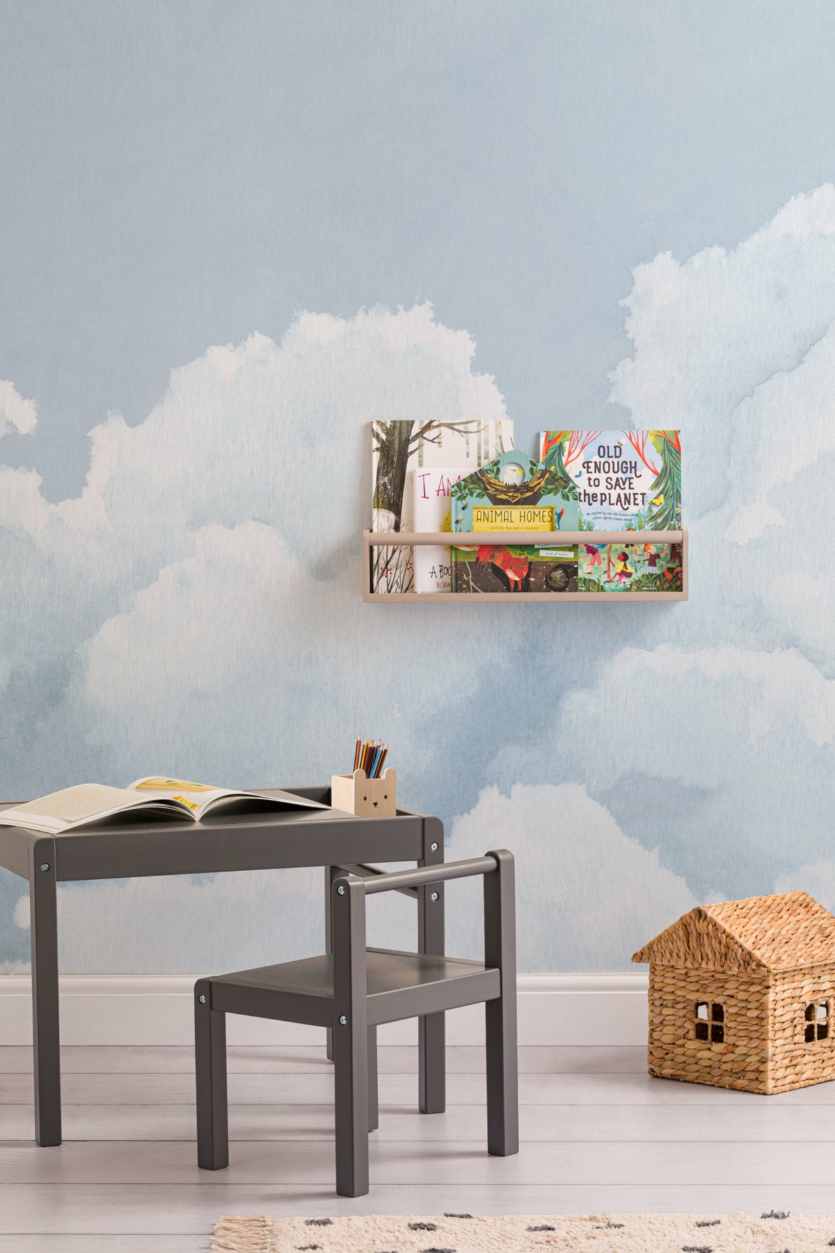 The Summer Cloudscape mural in pastel sky blue in a children's room setting