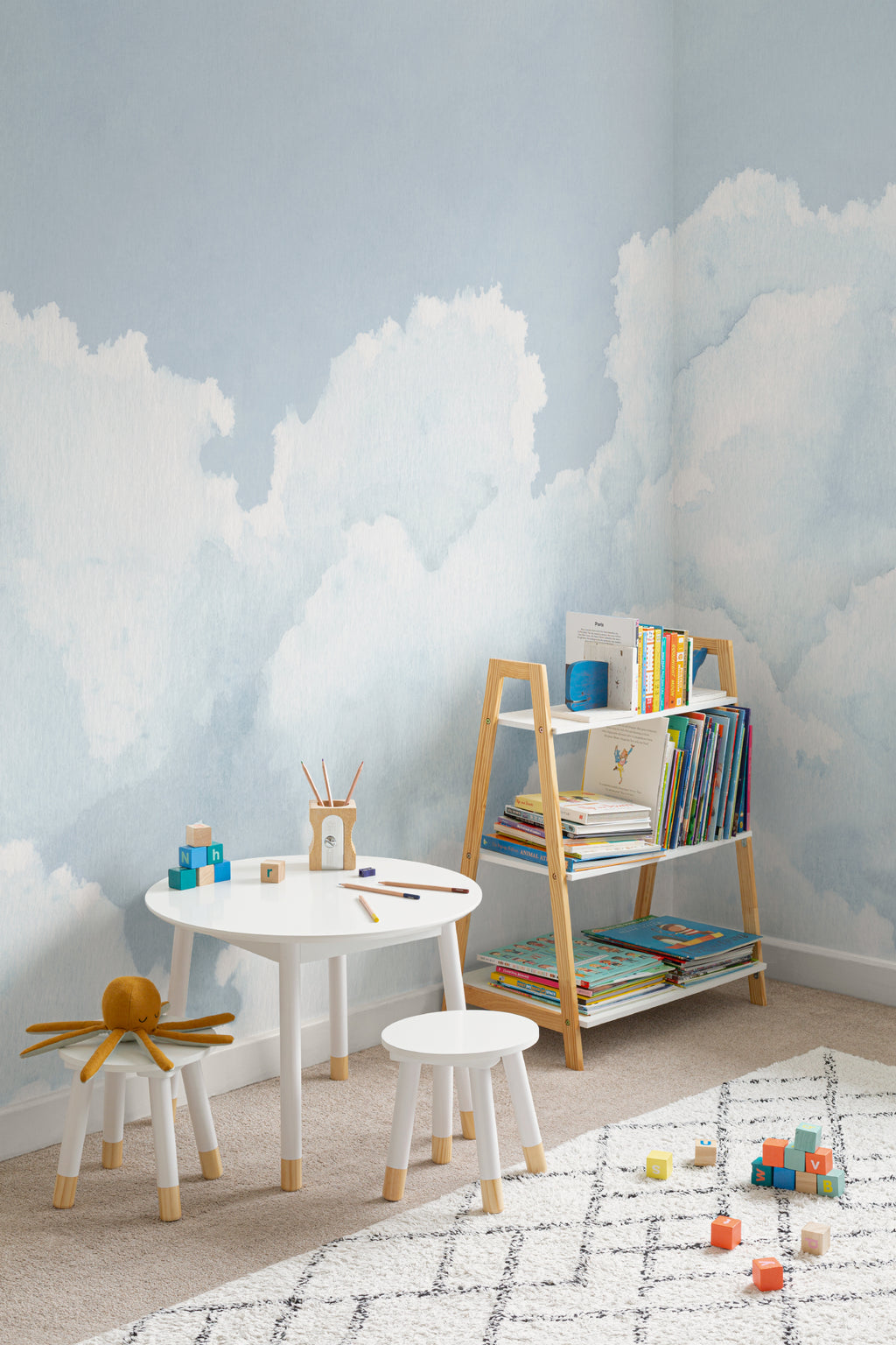 The Summer Cloudscape mural in pastel sky blue in a children's room setting, another angle